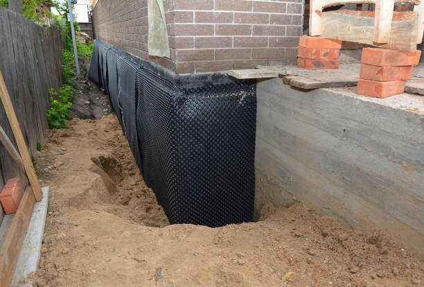 Happy homeowners after waterproofing job in New Straitsville